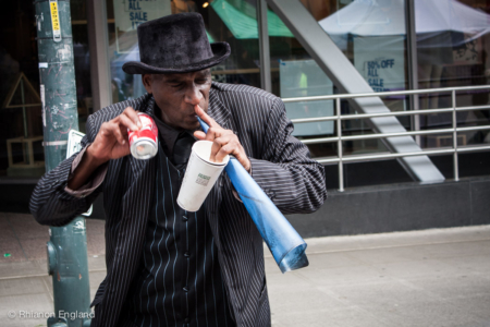 This guy was awesome. The music was coming from his paper horn, and the can was made into a shaker.